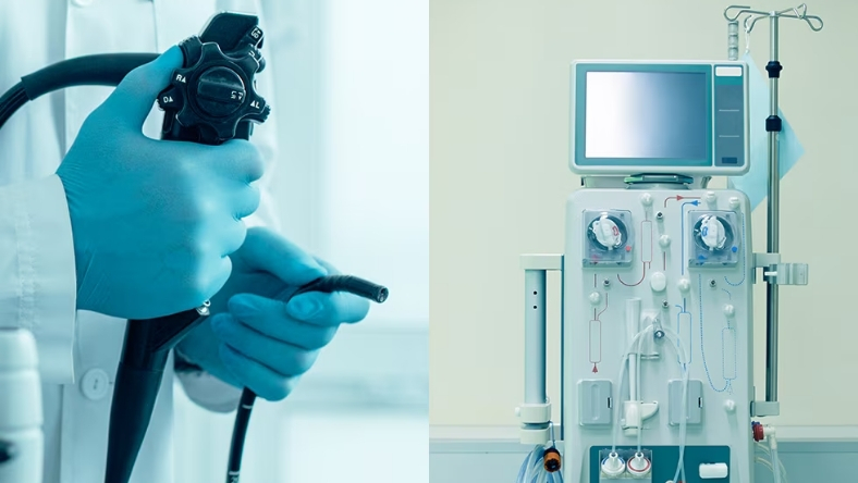 Gloved clinician holding endoscope beside medical sterilization equipment