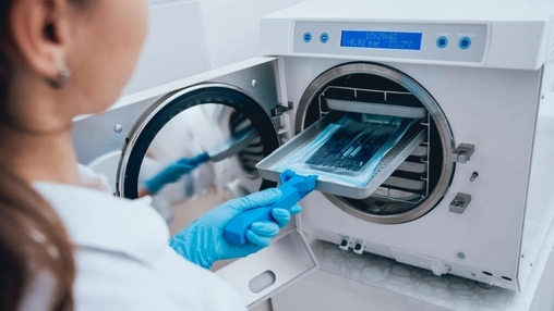 Industrial EO sterilizer system with stainless steel chamber, pipes, and control interface
