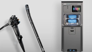 Two duodenoscopes and an ASP STERRAD sterilisation cabinet with a touchscreen
